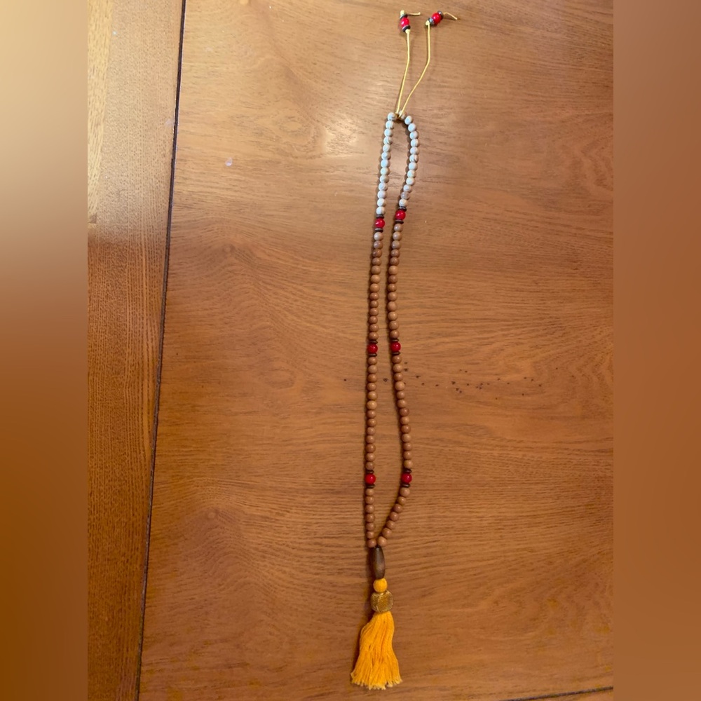 Wood and glass  Beaded Necklace with golden Tassel and red beads